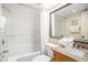 Clean bathroom features a shower-tub, granite countertop, and ample storage at 5308 N Ocean Blvd. # 1014, Myrtle Beach, SC 29577