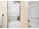 Modern bathroom with a stacked washer and dryer and walk in shower at 5308 N Ocean Blvd. # 1014, Myrtle Beach, SC 29577
