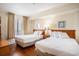 Bedroom with two queen beds, a window, and lamps on each nightstand at 5308 N Ocean Blvd. # 1014, Myrtle Beach, SC 29577