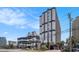 A multi-story condo complex featuring neutral toned exteriors with an attached parking deck at 5308 N Ocean Blvd. # 1014, Myrtle Beach, SC 29577