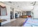 Spacious game room with a pool table, air hockey, dartboard, and vending machines on the wood floor at 5308 N Ocean Blvd. # 1014, Myrtle Beach, SC 29577