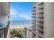 Gorgeous ocean view between buildings of towers with multiple floors and balconies with white railings at 5308 N Ocean Blvd. # 1014, Myrtle Beach, SC 29577