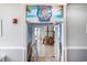 Inviting entrance to Cannonballz Bar & Grill, adorned with a tropical mural and an open doorway at 5308 N Ocean Blvd. # 1014, Myrtle Beach, SC 29577