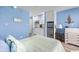 Bedroom with a comfortable bed and built-in kitchenette at 1100 Possum Trot Rd. # F-215, North Myrtle Beach, SC 29582