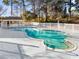 Inviting community pool with adjacent restrooms and a spa at 1100 Possum Trot Rd. # F-215, North Myrtle Beach, SC 29582