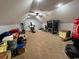 Large bonus room perfect for a home gym, featuring high ceilings and ample space at 2347 Devine St., Georgetown, SC 29440