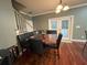 Cozy dining area featuring custom booth seating, hardwood floors, and access to the backyard at 2347 Devine St., Georgetown, SC 29440