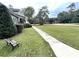 Charming home with a well-maintained lawn and a bench to enjoy the outdoors at 2347 Devine St., Georgetown, SC 29440