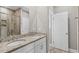 Bathroom features double sink vanity with granite countertops and tiled shower at 428 Meadow View Ct., Longs, SC 29568