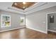 Bright bedroom featuring luxury vinyl plank flooring and large window at 428 Meadow View Ct., Longs, SC 29568