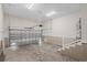 Spacious two-car garage with painted walls and concrete floor at 428 Meadow View Ct., Longs, SC 29568