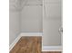 Walk-in closet with LVP flooring ready for shelving and organization at 428 Meadow View Ct., Longs, SC 29568