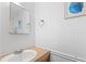 Bright bathroom with wood countertop vanity, mirror, and nautical decor at 6001-S32 S Kings Hwy., Myrtle Beach, SC 29575
