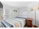 Quaint bedroom with window blinds and nightstand for an inviting space at 6001-S32 S Kings Hwy., Myrtle Beach, SC 29575