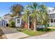 Charming home featuring a well-maintained lawn, a covered porch, and a convenient paved driveway at 6001-S32 S Kings Hwy., Myrtle Beach, SC 29575