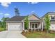 Inviting single-story home with tidy landscaping and a well-maintained front yard at 9742 Indigo Creek Blvd., Murrells Inlet, SC 29576