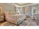 Well-lit bedroom with a queen-sized bed and stylish decor at 9746 Indigo Creek Blvd., Murrells Inlet, SC 29576
