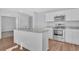 Modern kitchen with stainless steel appliances, granite countertops, and white cabinetry at 1534 Clubstone Dr., Conway, SC 29526