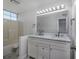 Bathroom with double vanity, marble countertop, and updated lighting at 2257 Essex Dr. # E, Surfside Beach, SC 29575