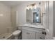 Clean bathroom with white vanity, marble countertop, and a shower/tub combo at 2257 Essex Dr. # E, Surfside Beach, SC 29575