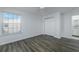 Bright bedroom with window, closet, and ceiling fan at 2257 Essex Dr. # E, Surfside Beach, SC 29575