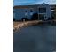 Condo building with water view and landscaping at 2257 Essex Dr. # E, Surfside Beach, SC 29575