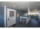 Hallway with door to condo unit at 2257 Essex Dr. # E, Surfside Beach, SC 29575