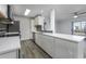 Modern kitchen with white cabinets and appliances at 2257 Essex Dr. # E, Surfside Beach, SC 29575