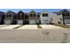 A row of new townhouses shows off their unique front exteriors in this community street view at 258-A Christiana Ln. # A, Myrtle Beach, SC 29579