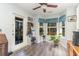 Cozy sunroom with natural light and views of the outdoors at 603 Bucks Trail, Longs, SC 29568