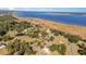 Stunning aerial view of a waterfront community with a pond and marsh leading to a beautiful waterway at 805 Comanders Island Rd., Georgetown, SC 29440