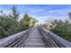 Long wooden boardwalk stretching into the marsh at 805 Comanders Island Rd., Georgetown, SC 29440