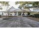 Charming home featuring rocking chairs on the covered front porch at 805 Comanders Island Rd., Georgetown, SC 29440