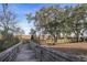 Elevated boardwalk featuring natural landscape and vegetation at 805 Comanders Island Rd., Georgetown, SC 29440