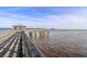 Wooden pier on the water featuring a covered gazebo structure at 805 Comanders Island Rd., Georgetown, SC 29440