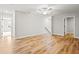 A room with light hardwood floors offers space and light at 805 Comanders Island Rd., Georgetown, SC 29440