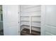 Pantry with floor to ceiling shelving for plenty of storage space at 1010 Club House Dr., North Myrtle Beach, SC 29582