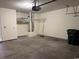 Garage with concrete floors, shelving, and a trash can at 1060 Fairway Ln. # 1060, Conway, SC 29526