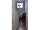 Inviting hallway with hardwood floors and a view to the living area at 1060 Fairway Ln. # 1060, Conway, SC 29526