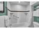 Clean bathroom with a shower-tub combo, white tile, and accessibility features at 2001 S Ocean Blvd. # 1506, Myrtle Beach, SC 29577