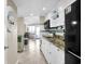 Well-equipped kitchen featuring granite countertops and modern appliances at 2001 S Ocean Blvd. # 1506, Myrtle Beach, SC 29577
