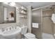 Bathroom featuring a sink with mirror, toilet, and enclosed shower at 2001 S Ocean Blvd. # 905, Myrtle Beach, SC 29577
