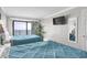 Bedroom with two beds, ocean view and a TV, perfect for relaxing on vacation at 2001 S Ocean Blvd. # 905, Myrtle Beach, SC 29577