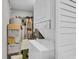Stacked white washer and dryer with energy efficient water heater for easy laundry at 2001 S Ocean Blvd. # 905, Myrtle Beach, SC 29577