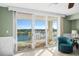 Balcony view with sliding glass doors, seating, and scenic waterfront views at 2151 Bridge View Ct. # 2502, North Myrtle Beach, SC 29582