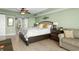 Bright bedroom featuring a plush bed with decorative pillows and a ceiling fan at 2151 Bridge View Ct. # 2502, North Myrtle Beach, SC 29582