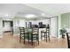 Kitchen area has a breakfast bar with seating, white cabinets, and modern appliances at 2151 Bridge View Ct. # 2502, North Myrtle Beach, SC 29582