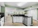 Kitchen includes stainless steel appliances, modern sink, and an open floor plan at 2151 Bridge View Ct. # 2502, North Myrtle Beach, SC 29582