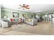 Spacious living room with dining area includes comfortable sofas and plenty of natural light at 2151 Bridge View Ct. # 2502, North Myrtle Beach, SC 29582