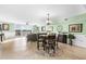 Open living space includes a dining area and view of the balcony with water views at 2151 Bridge View Ct. # 2502, North Myrtle Beach, SC 29582